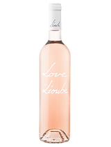 Bouteille de vin rosé "Love by Léoube" avec étiquette blanche.